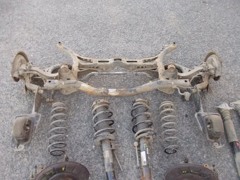 Díly podvozku VW Touran 1.4TSI 103kw - 2