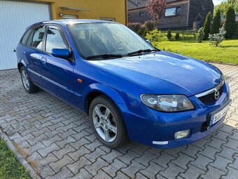 Mazda 323f bj - 2