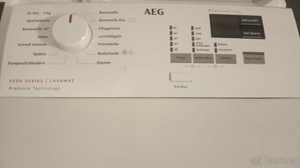 Vrchem plněná pračka AEG - 2