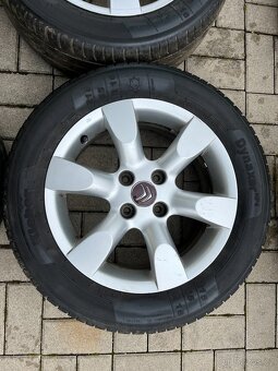 4x litá kola 4x108 R16, letní pneu - 2