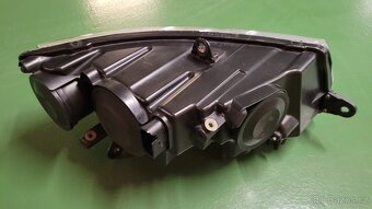 Škoda Superb 2 předface Levý bixenon - 2