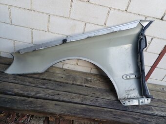 CLK W209 Blatník pravý - 2