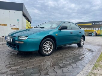 Mazda 323f 1.5 66 KW DOHC. Klima, el.okna, ALU kola - 2