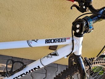 Dětské jízdní kolo Btwin Rockrider 300 24". - 2