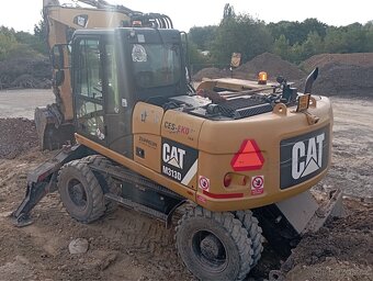 Caterpillar M313D - 2