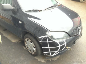 Mazda 2 1,4i 59kW 2006 - díly - 2