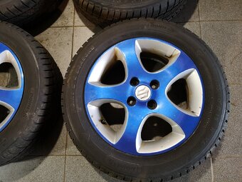 Suzuki Swift alu 15 + celoroční 185/60/15. - 2