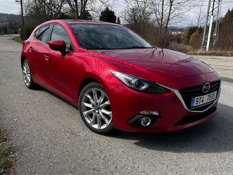 Mazda 3 2.0 Skyactiv G (121 kW) • Revolution • 2015 - 2
