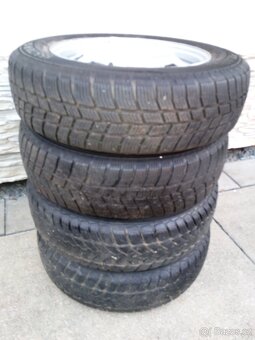 Starší zimní kola 155/70 R13 - 2