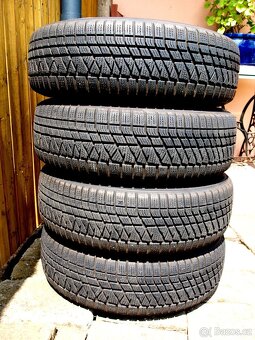 Alu kola Mitsubishi R16, 6.5J/ET46, KUMHO 215/70 - 2