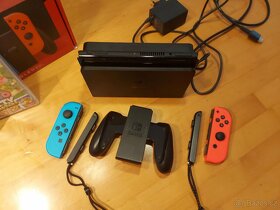Nintendo Switch OLED v záruce + hry + účet - 2