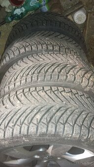 ALU kola na Peugeot+celoroční pneu 205/55 R16 - 2