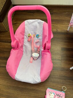 Postýlka a autosedačka pro panenky + peněženka jednorožec - 2