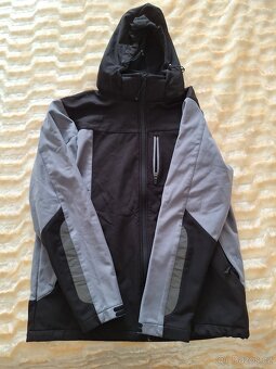 Pracovni softshellova bunda. - 2