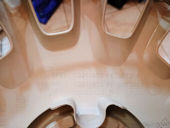 Poklice Opel Corsa 14" original - 2