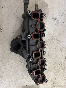 Sací potrubí s vířivými klapkami 03L129711AG - 2