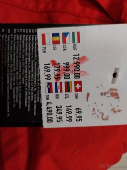 Zimní bunda zimní vel:152  . Nová. - 2
