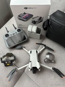 Dron DJI Mini 4 Pro Fly More Combo (DJI RC 2) - 2