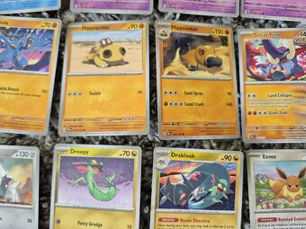 Pokémon Prismatic Evolutions, 48 karet - 2
