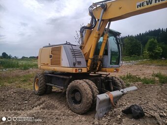 Bagr kolový new Holland mh city 18t - 2