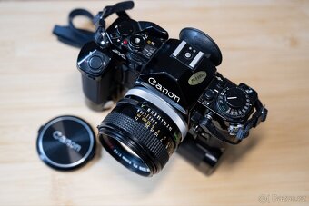 REZERVACE - Canon A-1 + FD 50/1.4 SSC + příslušenství - 2