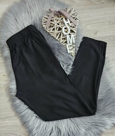 Černé kalhoty Lindex - 2