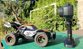Rezervace. Terénní auto na dálk.ovl. Sand Rider 1:24 oranž - 2
