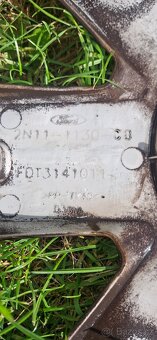 Poklice Ford 15" originál použitá. - 2