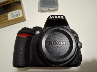 D3100 + AF-S DX Nikkor 18-105 mm f3.5.-5.6G ED VR - 2