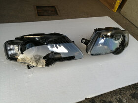 VW Passat B6 přední světla-Black. - 2