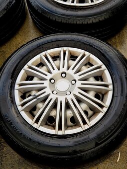 4x plecháče + plastové kryty. 215/65R 16C zátěžové - 2