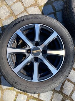 Sada kol 4x100 s letní pneu 175/60 R14 - 2