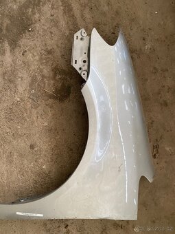 Blatník volkswagen Touran facelift - 2