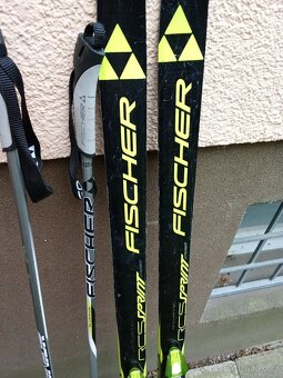 set na běžky Fischer , 140cm a hůlky 125cm - 2