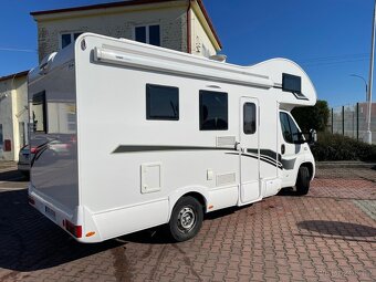 Obytný vůz alkovna XGO - 2