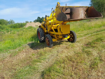 Traktor bagr / nakladač Ford - 2