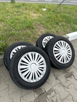 Prodám plechové disky s pneu 165/70 R14 - 2