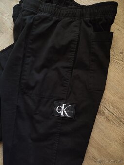 Calvin Klein pánské černé kalhoty - vel. XL - 2