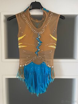 Gymnastické dresy vel.124cm - 2