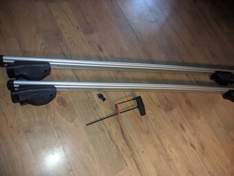 Příčníky a síťka RAV4 originální - 2