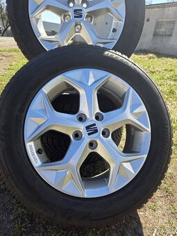 Zánovní zimní sada Seat Ibiza V 15" 5x100 pneu 185/65/15 - 2