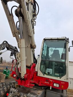 Kolovy bagr Takeuchi TB295w.ne jcb.cat.komatsu - 2