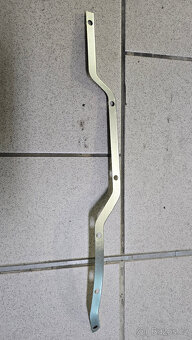 MERCEDES W116 A1167270236 držák těsnění LP dveří - 2