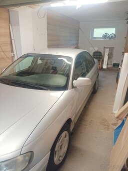 Opel omega b 2.5 děti manual - 2