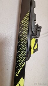 Kolečkové lyže skate Fischer + hůlky 155 cm - 2