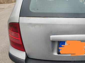 Páté dveře Octavia 1 - 2