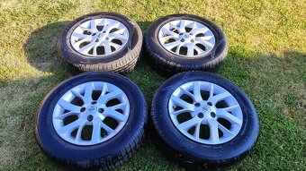 Alu disky Nissan 15" + pneu Nokian 185/65 R15 - 2