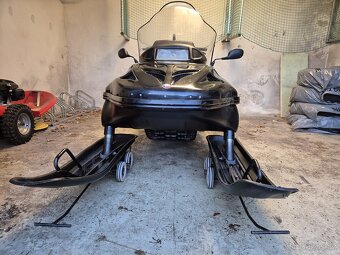 sněžný skútr se stopařem - 2