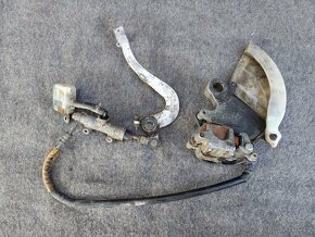 Prodám zadní brzdu Suzuki RM125 - 2