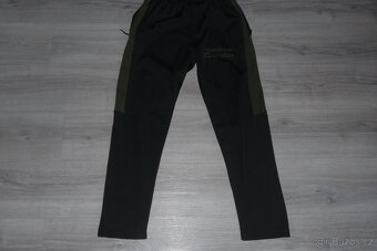 tepláky vel. M sportovní kalhoty zn. puma - 2